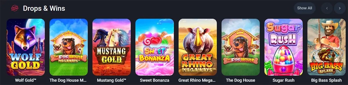 Casino “Drops & Wins” section featuring a row of popular slot games including Wolf Gold, The Dog House Megaways, Mustang Gold, Sweet Bonanza, Great Rhino Megaways, The Dog House, Sugar Rush, and Big Bass Splash on a dark-themed interface.